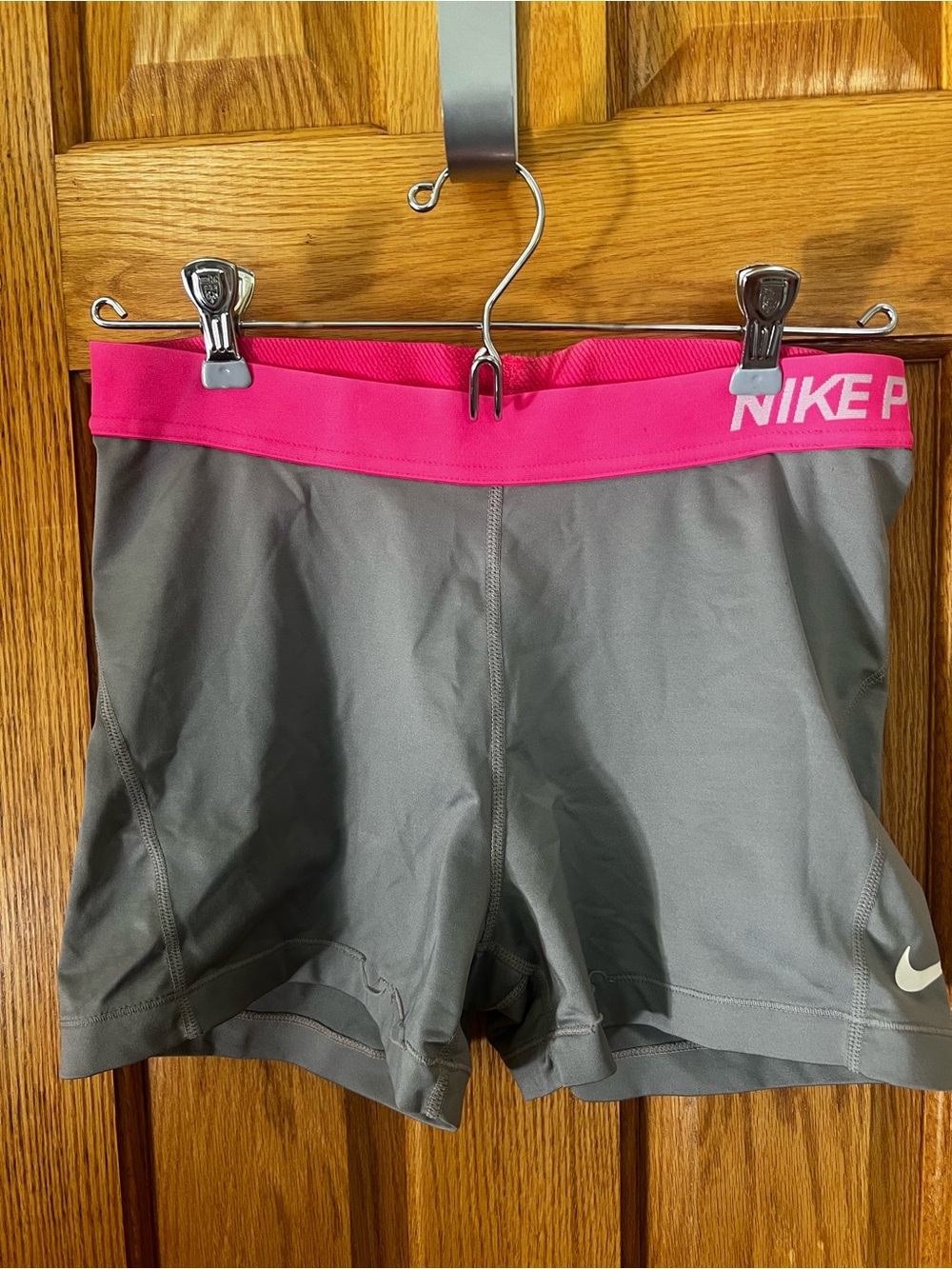 Nike Women's Gray Athletic Shorts with Hot Pink Waistband